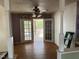 Inviting dining area with French doors leading to a screened porch, perfect for relaxing at 2102 Michael Ln, Smithfield, NC 27577