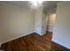 Cozy bedroom with hardwood floors, and neutral walls; adjacent to two closets at 2130 Pearidge Rd, Angier, NC 27501