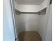 Spacious walk-in closet with upper shelving and great potential for organization at 2130 Pearidge Rd, Angier, NC 27501