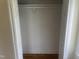 Walk-in closet with white walls and hardwood floors at 2130 Pearidge Rd, Angier, NC 27501