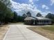 Brick house with a concrete driveway at 2130 Pearidge Rd, Angier, NC 27501