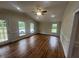 Spacious living room with hardwood floors, multiple windows for natural light and recessed lighting at 2130 Pearidge Rd, Angier, NC 27501