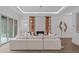 Spacious living room featuring a large sofa, fireplace, and built-in shelving at 2200 Paddstowe Main Way, Wake Forest, NC 27587