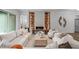 Stylish living room featuring a modern fireplace, shelving, and comfortable seating arrangement at 2200 Paddstowe Main Way, Wake Forest, NC 27587