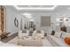 Open-concept living room with neutral tones, modern decor, and seamless flow to other areas at 2200 Paddstowe Main Way, Wake Forest, NC 27587