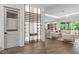 Bright living space with built in wine rack, hardwood floors and open floor plan at 2200 Paddstowe Main Way, Wake Forest, NC 27587