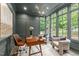 Sophisticated office with wainscoting, designer lighting, and comfortable seating at 2200 Paddstowe Main Way, Wake Forest, NC 27587