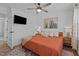 Comfortable bedroom with a large window for natural light and stylish furnishings at 2207 Otis St # B, Durham, NC 27707