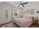 Serene bedroom with a cozy bed, natural light, and neutral decor for relaxation at 2207 Otis St # B, Durham, NC 27707