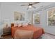 Comfortable bedroom with a large window for natural light and stylish furnishings at 2207 Otis St # B, Durham, NC 27707