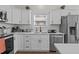 Well-equipped kitchen with stainless steel appliances and white cabinetry at 2207 Otis St # B, Durham, NC 27707