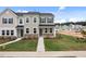 Charming new construction townhomes with manicured lawns and stone accents in a desirable community at 2313 Kasota Ln, Raleigh, NC 27610