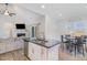 Modern kitchen open to living area and dining area at 241 N Nolan Park Dr, Selma, NC 27576