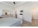 This primary bedroom features a walk in closet, neutral walls and carpeted floor at 241 N Nolan Park Dr, Selma, NC 27576