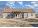 Spacious backyard featuring a covered patio, providing a versatile space for relaxation and entertainment at 2440 Us 70 A, Selma, NC 27576
