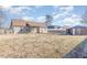 Expansive backyard offering ample space, featuring a covered patio and storage shed at 2440 Us 70 A, Selma, NC 27576