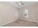 Comfortable bedroom with a ceiling fan, carpet flooring, and a window bringing in natural light at 2440 Us 70 A, Selma, NC 27576