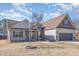 Charming two-story home featuring a two-car garage, landscaped yard and inviting front porch at 2440 Us 70 A, Selma, NC 27576