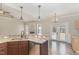 Well-equipped kitchen features a breakfast bar, stainless steel appliances and lots of natural light at 2440 Us 70 A, Selma, NC 27576