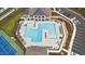 Aerial view of community pool and recreational areas including tennis courts and clubhouse at 2620 Club Level Dr, Apex, NC 27523