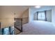Large bonus room provides versatile living space with natural light at 2620 Club Level Dr, Apex, NC 27523