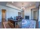 Spacious living room with fireplace, leather chairs, and stylish decor at 2620 Club Level Dr, Apex, NC 27523