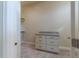 Walk-in closet provides ample storage with drawers and shelving at 2620 Club Level Dr, Apex, NC 27523