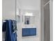 Bathroom with a double sink vanity, window, and shower at 2808 Newquay St, Durham, NC 27705