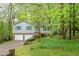 Charming two-story home with blue shutters, brick accents, and a well-maintained front yard at 2808 Newquay St, Durham, NC 27705