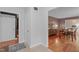 Hallway showcasing the entrance to the dining room with lovely wood floors at 2808 Newquay St, Durham, NC 27705