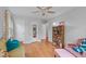 Comfortable living room features hardwood floors, plenty of natural light, and a bookshelf at 2808 Newquay St, Durham, NC 27705