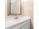 Bathroom featuring a vanity with a white countertop and a framed mirror at 2868 Anfield Rd, Raleigh, NC 27606