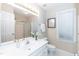 Neutral bathroom featuring tile floor, shower, and sink at 2868 Anfield Rd, Raleigh, NC 27606