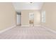 Bedroom showcasing a bathroom and walk-in closet for added convenience at 2868 Anfield Rd, Raleigh, NC 27606