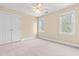 Bedroom with a closet and windows, providing comfort and natural light at 2868 Anfield Rd, Raleigh, NC 27606