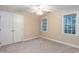 Bright bedroom with natural light and closet at 2868 Anfield Rd, Raleigh, NC 27606