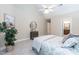 Neutral bedroom with plush carpet, leafy plant, and dresser for comfortable and stylish living at 2868 Anfield Rd, Raleigh, NC 27606