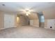 Spacious bedroom with carpet, fan, and closet at 2868 Anfield Rd, Raleigh, NC 27606