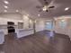Open kitchen with stainless steel appliances, granite countertops, and a large island at 32 Tanseyleaf Dr, Smithfield, NC 27577