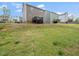 Backyards of a neighborhood, featuring lawn space and decks for outdoor enjoyment at 329 Chamberlain Dr, Clayton, NC 27527