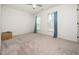 Bedroom with blue curtains, neutral carpet, and plenty of space for furniture at 329 Chamberlain Dr, Clayton, NC 27527