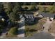 Aerial view of the house, showcasing its location in a lush, green neighborhood at 35 Fairway Ct, Dunn, NC 28334