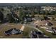 Community aerial view of a neighborhood highlighting the landscaping and variety of home styles at 35 Fairway Ct, Dunn, NC 28334
