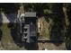 A bird's eye view of the home highlighting its roof and wooden deck at 35 Fairway Ct, Dunn, NC 28334