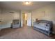 Adorable Bedroom with recliner, crib, and inspirational wall art at 35 Fairway Ct, Dunn, NC 28334