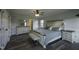 A bright bedroom with modern flooring and a ceiling fan to enhance your comfort at 35 Fairway Ct, Dunn, NC 28334