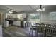 Bright eat-in kitchen featuring stainless appliances, granite counters, and a sliding glass door at 35 Fairway Ct, Dunn, NC 28334