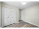 Bedroom boasts hardwood flooring and a large closet offering ample storage space at 3717 Phillips W Way, Durham, NC 27713
