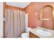 Cozy bathroom featuring a shower, toilet, vanity area and neutral color pallette at 3808 Johnson Pond Rd, Apex, NC 27539