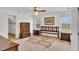 Bedroom with natural light, carpet flooring, ceiling fan and classic furniture at 3808 Johnson Pond Rd, Apex, NC 27539